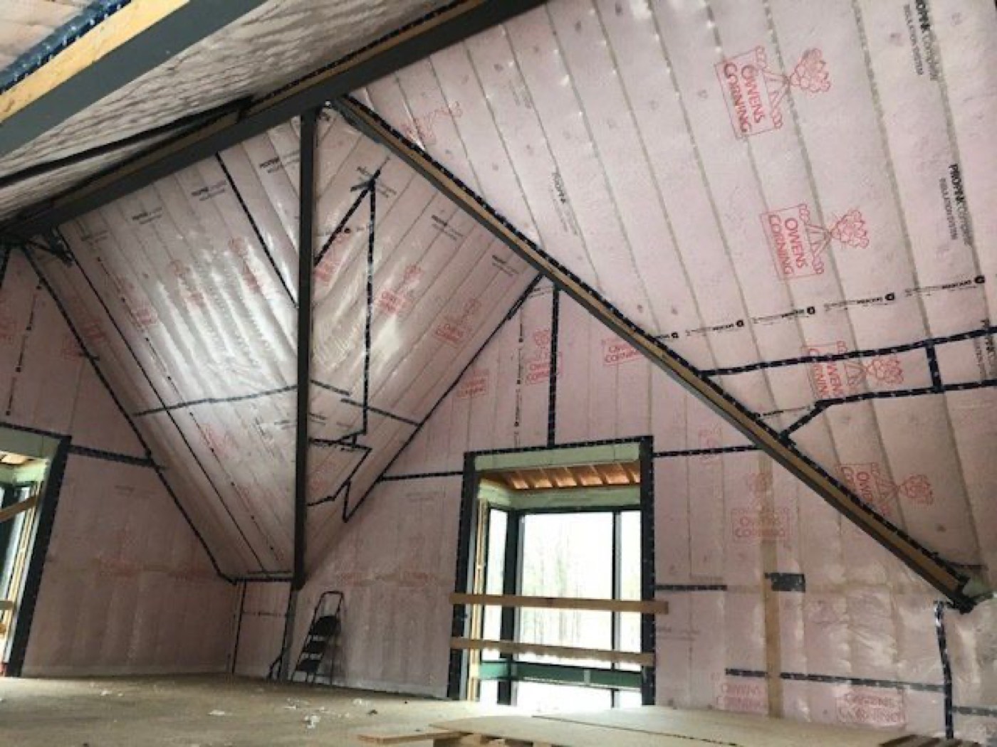 Upper storey rafters and knee walls insulated with batt