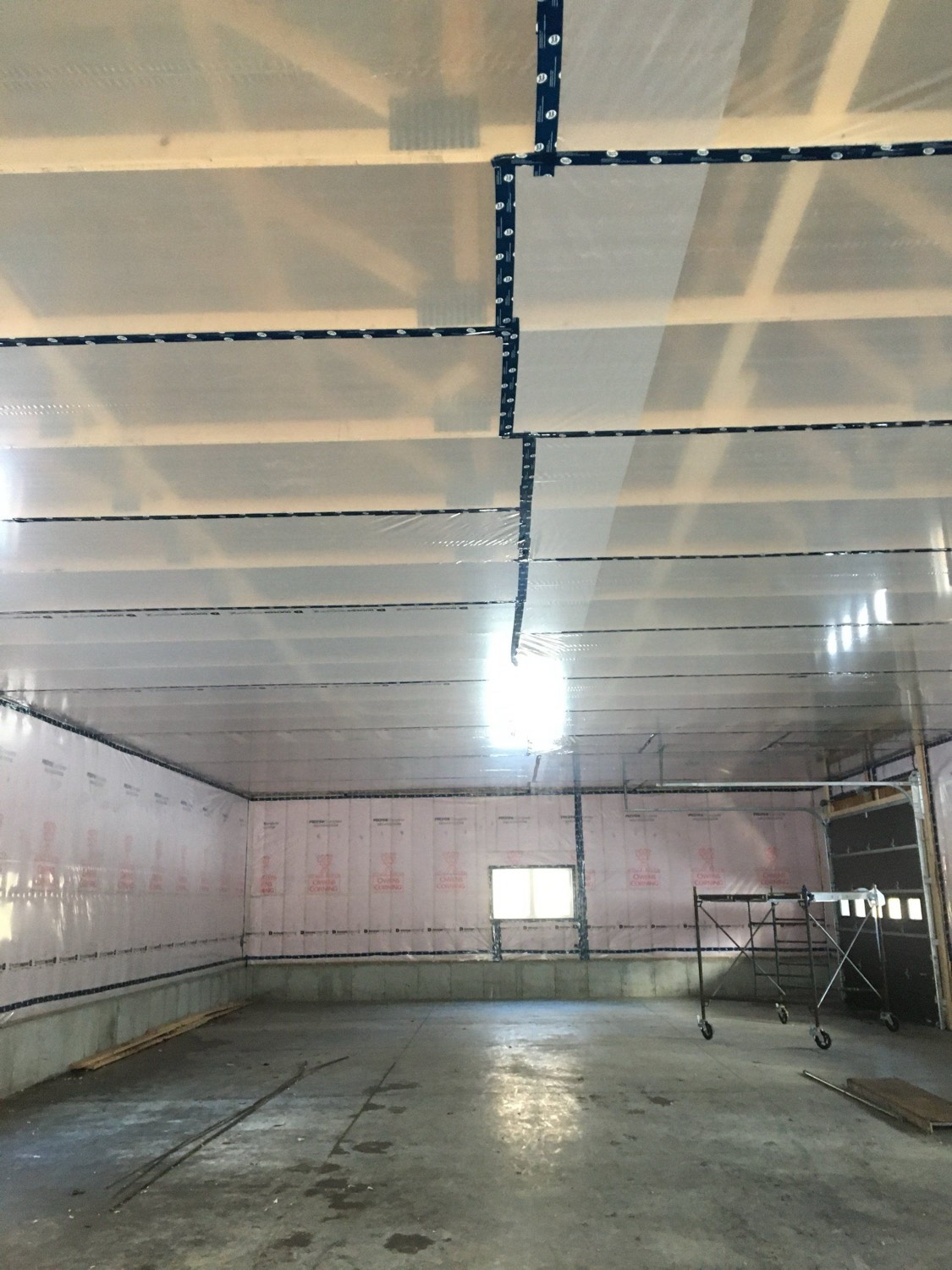 Large open commercial building with insulated ceiling