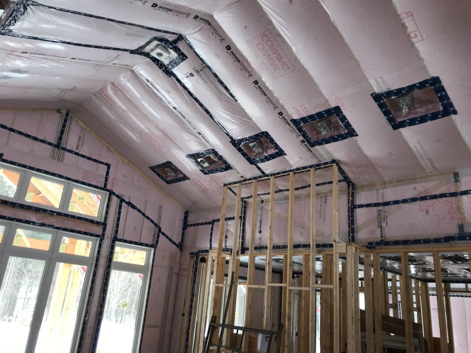 Vaulted ceiling insulated and prepared for finishing