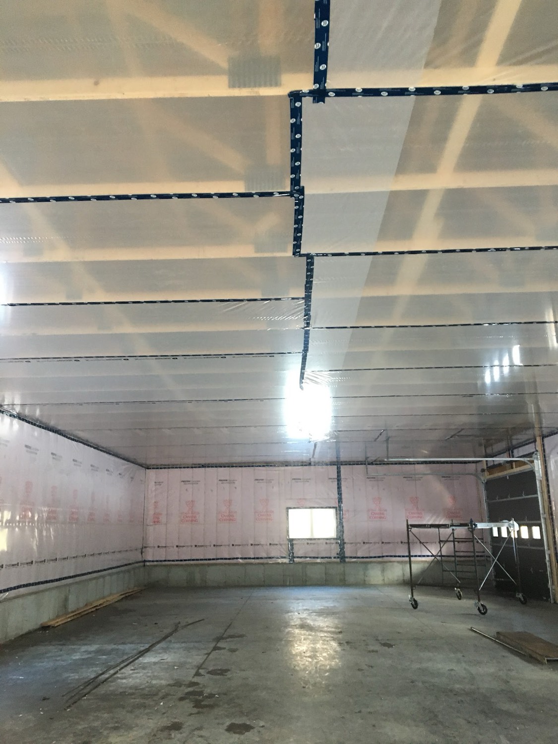 Large room with the walls and ceiling insulated and sealed