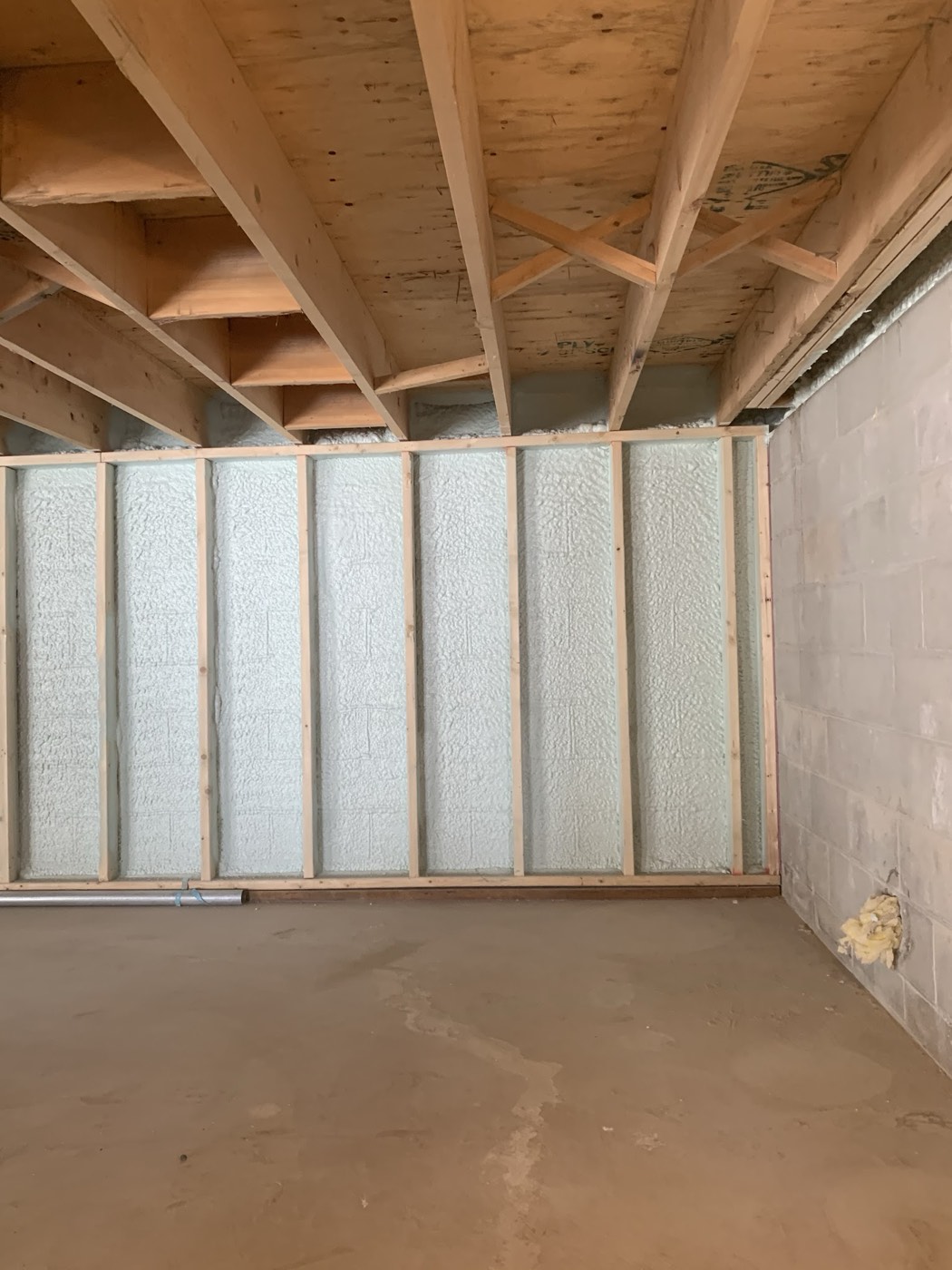 Wall cavities filled and faced, ready for drywall