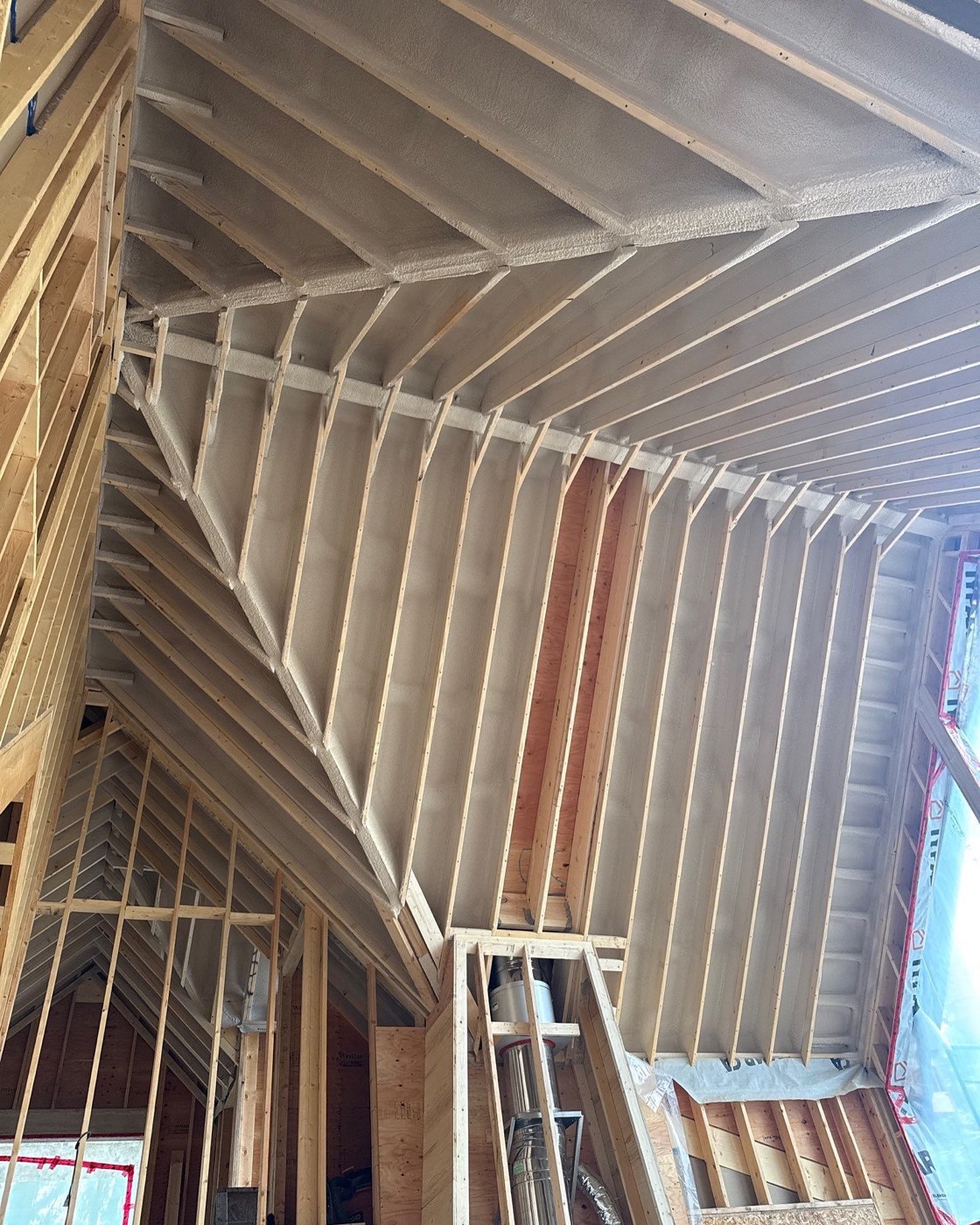 Insulated wall system with vertical strapping on a recent project
