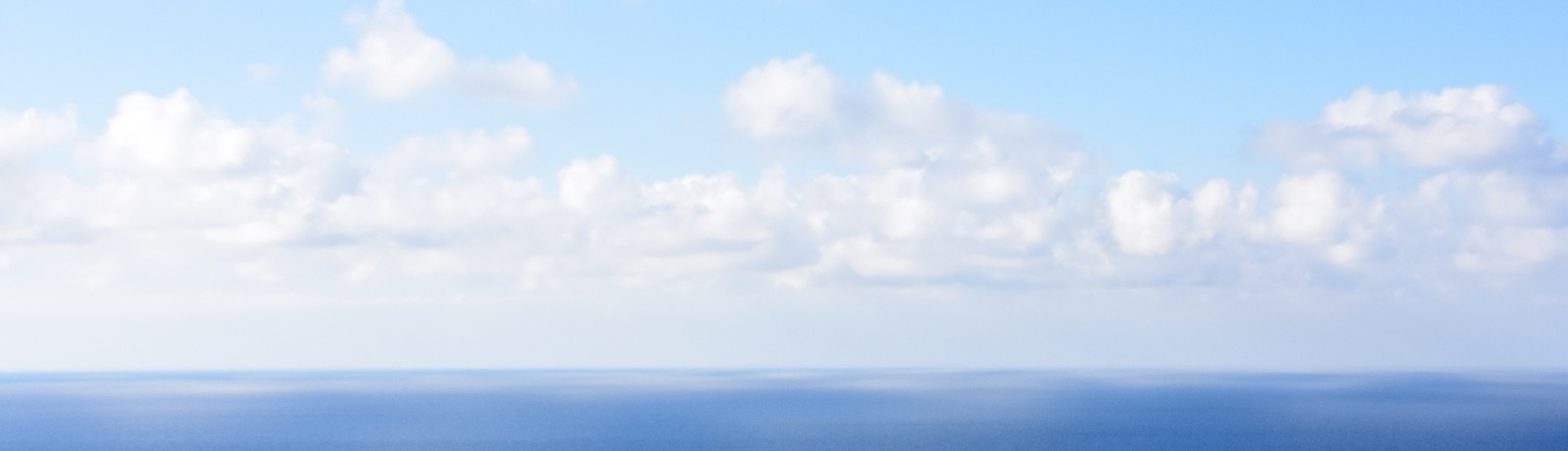 Cloud band used as a section background (sky cropped from a sea-and-sky frame)