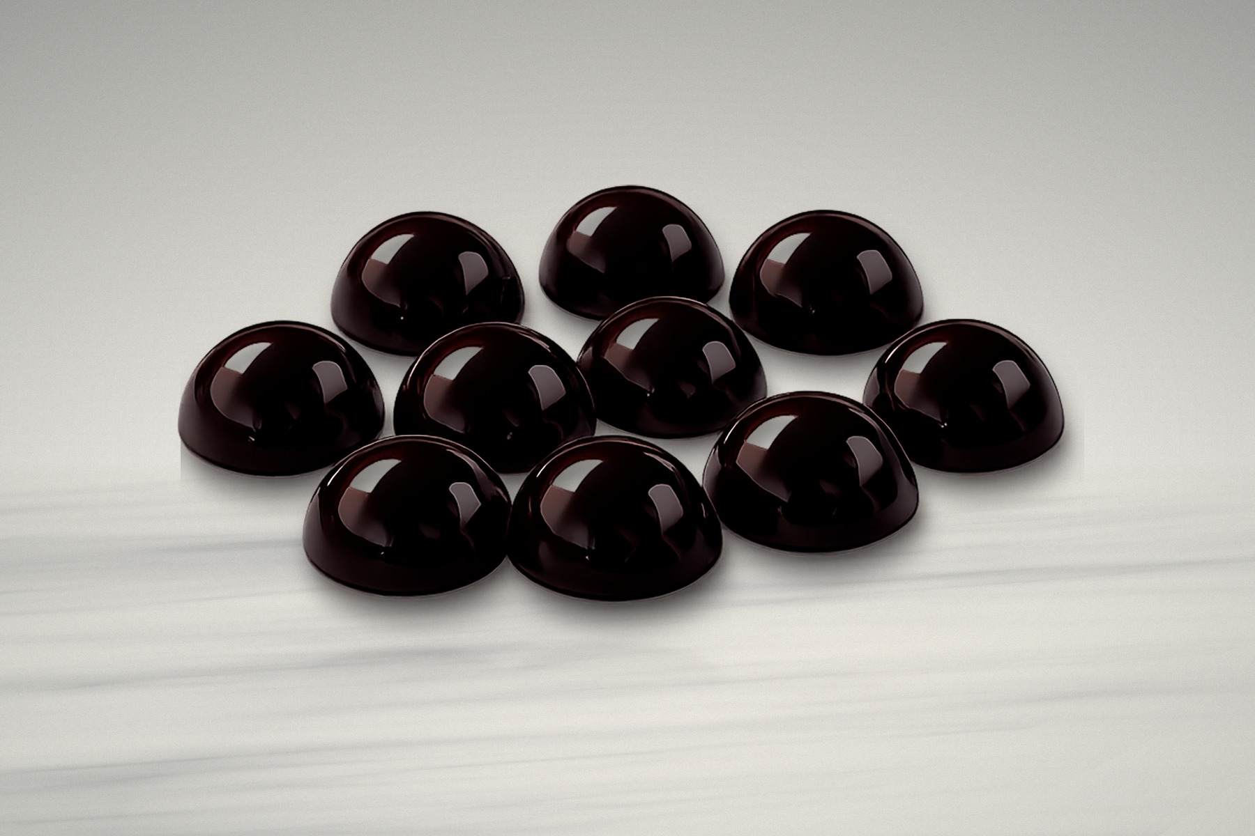 The ten dark chocolate pieces in a pack of MICRO ZEN DARK