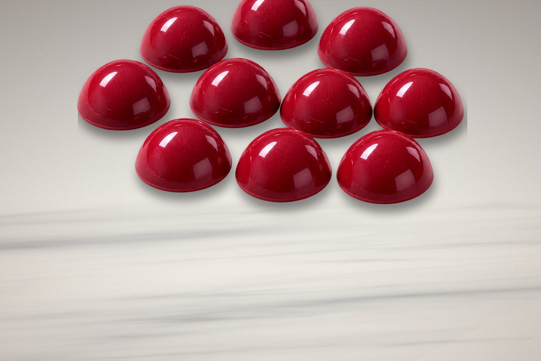 The ten raspberry chocolate pieces in a pack of MICRO ZEST RASPBERRY